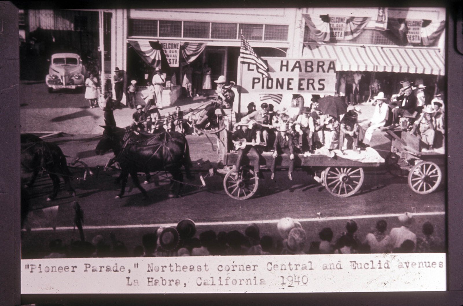 La Habra Old Settlers entry in the La Habra Fiesta parade at Central and Euclid Avenues, 1940.