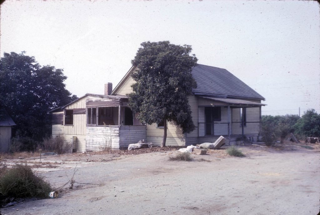 View of home at one of the Orange County ranches owned by "Colonel" Robert J. Northam, at the present-day corner of Imperial Highway and Harbor Boulevard in La Habra, Calif. The ranch included one of the first orchards in La Habra, an 80-acre walnut grove planted in 1891. Photograph date unknown.
